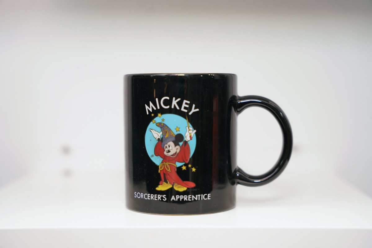 Black Disney Mickey Mouse Sorcerer's Apprentice mug Mickey red robe blue wizard hat stars MICKEY SORCERER'S APPRENTICE white text