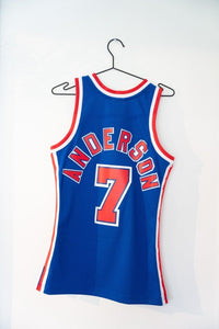 Mitchell & Ness New Jersey Nets basketball jersey number 3 from 1993-94 season, displayed flat showing front mesh panel and team logo in black and white