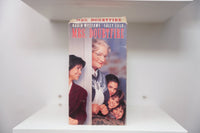 Mrs. Doubtfire VHS cover with Robin Williams in grey wig and glasses as Mrs. Doubtfire peering around door with children, Sally Field standing nearby
