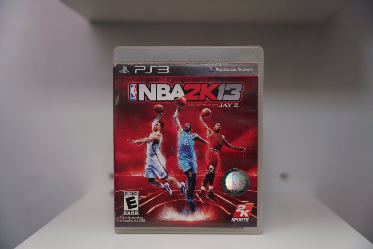 PlayStation 3 NBA 2K13 PS3 case red background Kevin Durant Blake Griffin Derrick Rose NBA 2K13 text Jay Z executive produced 2K Sports