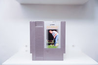 NES Jack Nicklaus Greatest 18 Holes grey cartridge with photo of Nicklaus mid-swing on golf course, Konami logo, Made in Japan