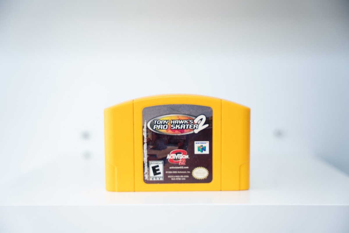 Nintendo 64 Tony Hawk's Pro Skater 2 yellow N64 cartridge dark label Pro Skater 2 logo Activision ESRB Everyone