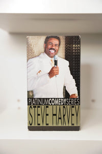 VHS Steve Harvey One Man white suit microphone laughing ONE MAN text PLATINUM COMEDY SERIES STEVE HARVEY gold banner