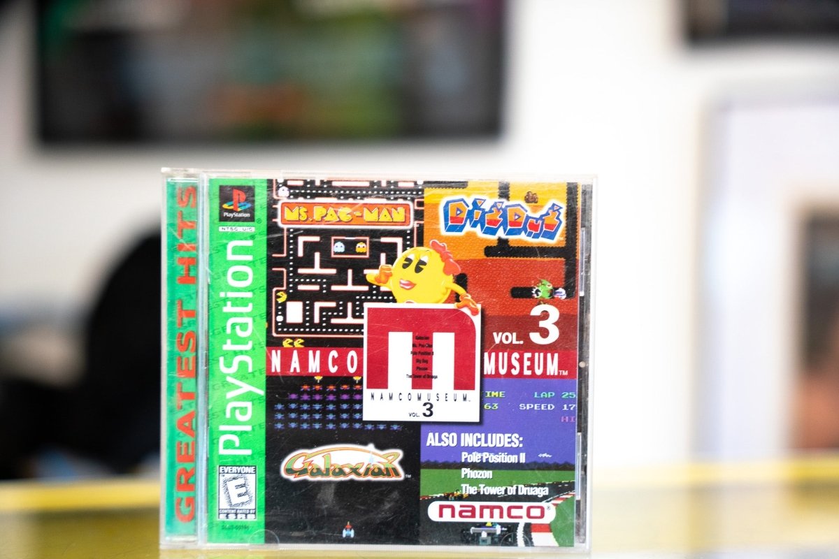 PlayStation Namco Museum Vol 3 Greatest Hits green label jewel case with Ms Pac-Man Dig Dug Galaxian screenshots and red Namco Museum logo