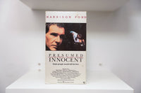 VHS Presumed Innocent Harrison Ford dark close-up HARRISON FORD PRESUMED INNOCENT serif text kill for love tagline Alan J Pakula Warner Bros