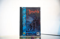 Sega CD Bram Stoker's Dracula game complete in tall case blue spine Gothic castle dark sky red Dracula script text Sony Imagesoft MA-13