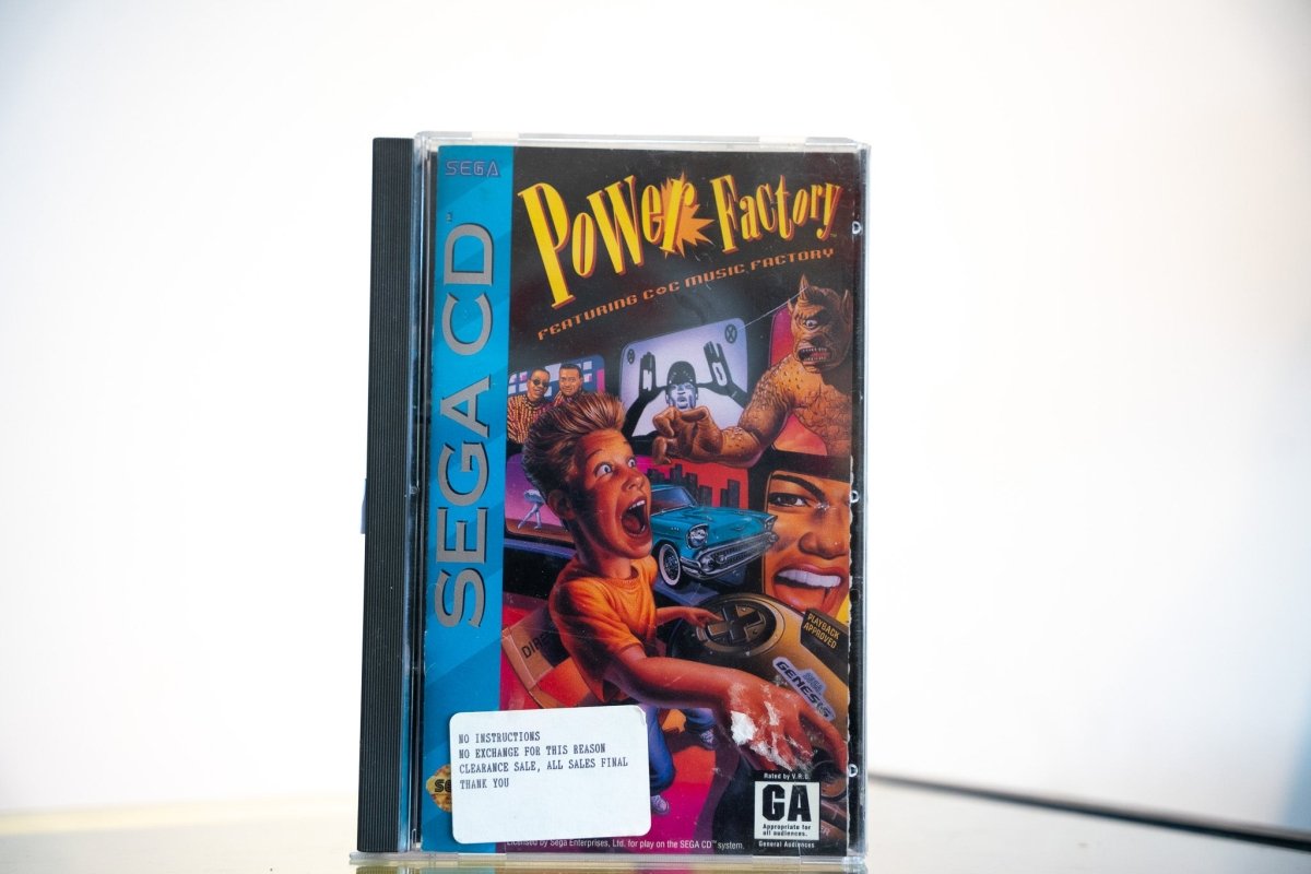 Sega CD Power Factory Featuring C+C Music Factory game complete in tall case blue spine chaotic collage cover POWER FACTORY yellow red text GA rating