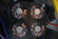 Sega CD Slam City with Scottie Pippen four disc set displayed in sleeves colorful FMV artwork Digital Pictures SEGA CD text Teen rating