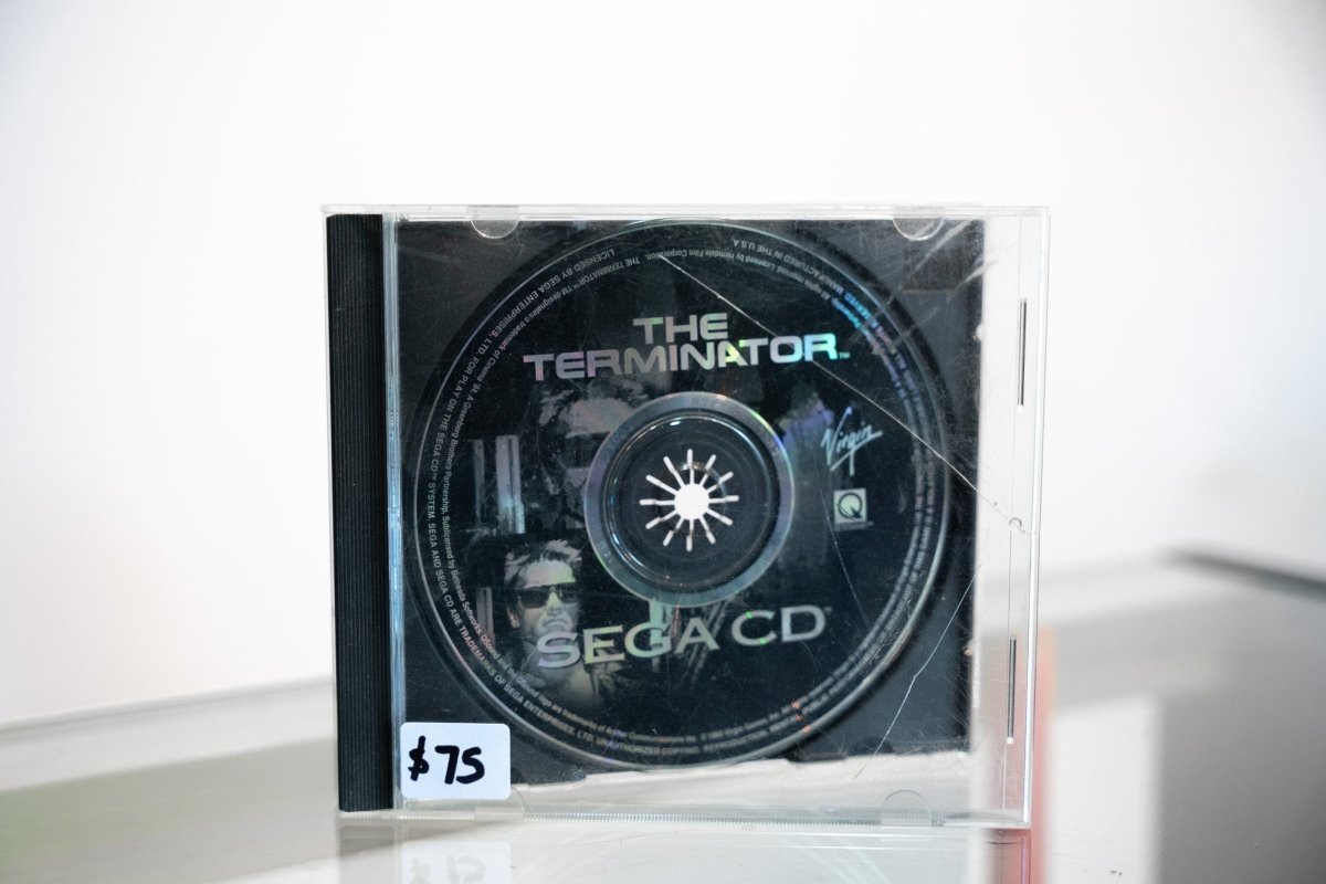 Sega CD The Terminator disc only dark disc in jewel case silver THE TERMINATOR text Arnold Schwarzenegger image Virgin Games Sega CD logo