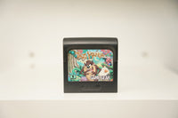 Sega Game Gear Taz-Mania cartridge with cartoon Tasmanian Devil in tropical jungle, Taz-Mania jungle-styled text