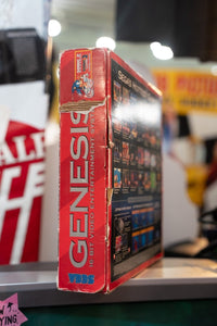 Sega Genesis console with Sonic 2 game, original box, controllers, and cables displayed together, 1992 release