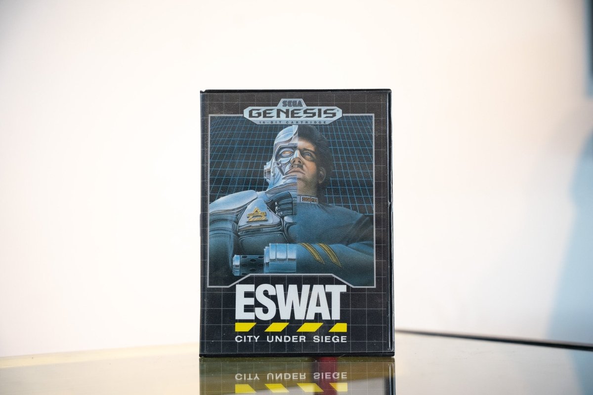 Sega Genesis ESWAT City Under Siege game clamshell case cyber-cop half human half robot face blue silver armor ESWAT silver text grid background