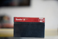 Sega Master System Rambo III black cartridge with red label strip gold Rambo III title and Sega For The 90s logo