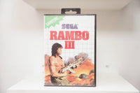 Sega Master System Rambo III clamshell case with Rambo holding weapon amid explosions, green Shooting category banner, Sega logo
