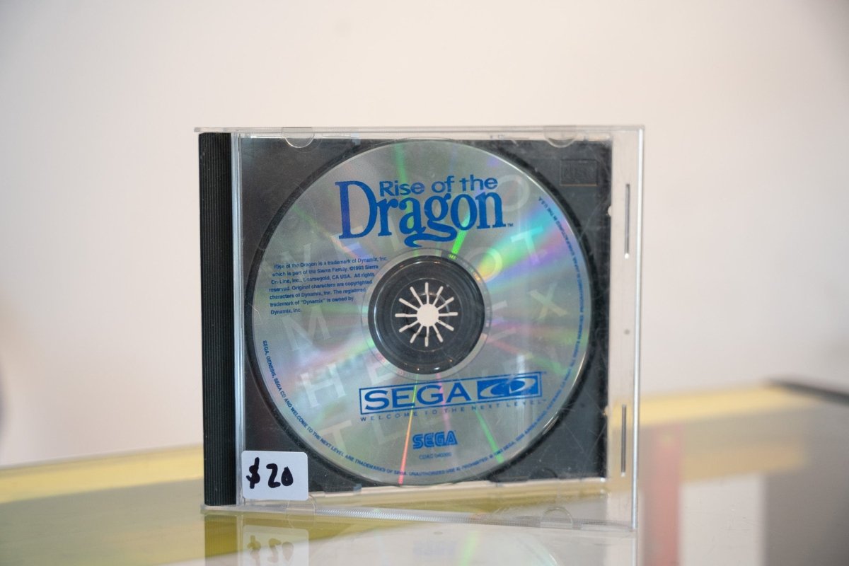 Sega CD Rise of the Dragon disc only silver holographic disc in jewel case white Rise of the Dragon text Sega CD logo Dynamix Sierra