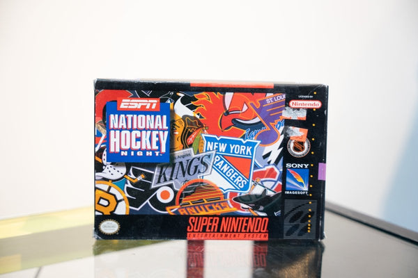 SNES ESPN National Hockey Night box with NHL team logos collage including Kings, Rangers, Blackhawks, Canucks, Flyers, ESPN logo, Sony Imagesoft