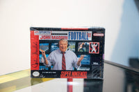 SNES John Madden Football 93 box with smiling John Madden in headset and tie, EA Sports Electronic Arts, appears sealed in shrink wrap