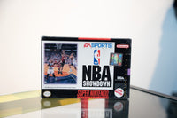 SNES NBA Showdown box with basketball players under basket, EA Sports logo, NBA holographic sticker, Licensed by Nintendo