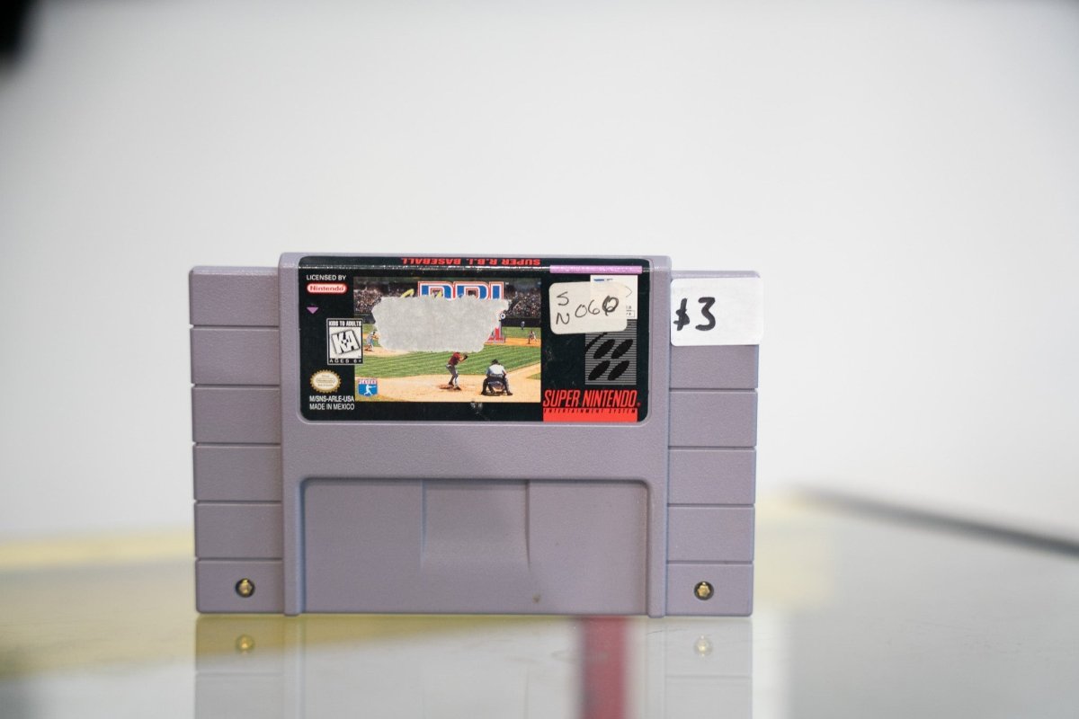 SNES Super R.B.I. Baseball grey cartridge with baseball gameplay screenshot, worn label with peeling, $3 price sticker