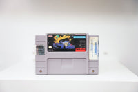 SNES Spindizzy Worlds grey cartridge with geometric craft on isometric platforms, ASCII Ware logo, video rental store stickers