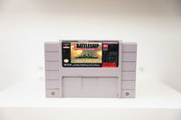 SNES Super Battleship grey cartridge with warship silhouette at sunset and targeting crosshair, Mindscape Software Toolworks logo