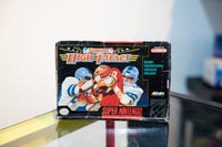 SNES Super High Impact box with intense football tackle illustration, Bone-Crunching Arcade Smash tagline, Acclaim logo, box shows wear