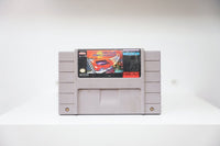 SNES Top Gear 3000 grey cartridge with futuristic red race car and alien character, checkered flag, Kemco logo