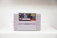 SNES Xardion grey cartridge with dark mecha robot artwork and purple lightning, Asmik Corporation of America logo, Made in Japan