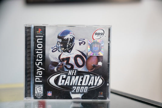 PlayStation NFL GameDay 2000 black label jewel case with Terrell Davis Broncos 30 jersey rushing silver title 989 Sports NFL hologram