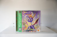 PlayStation Spyro the Dragon Greatest Hits green label purple dragon orange horns castle backdrop SPYRO the Dragon purple gold text Insomniac Sony