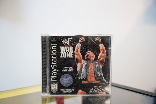 Sony PlayStation WWF War Zone game 1998 Acclaim Sports Stone Cold Steve Austin fists raised black vest dark background jewel case Teen rating