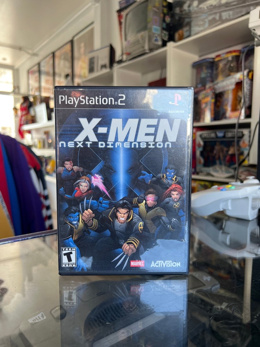 PS2 X-Men Next Dimension CIB case Wolverine claws Storm Beast Cyclops X logo X-MEN NEXT DIMENSION text Marvel Activision Teen