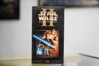 Star Wars Attack of the Clones Episode II VHS black sleeve with gold II Roman numeral gold STAR WARS logo character montage with Anakin Yoda and THX badge