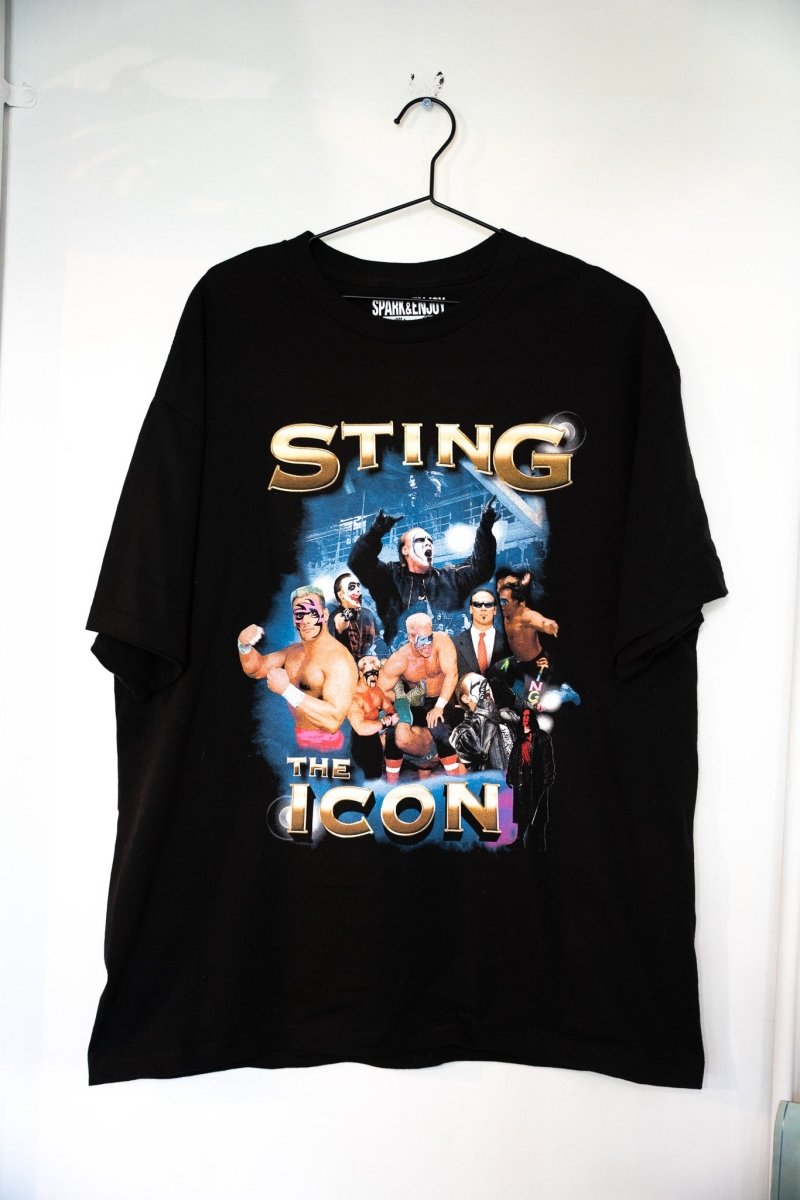Black Sting The Icon Spark and Enjoy t-shirt with gold STING lettering and career photo collage montage of multiple Sting eras size XL