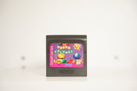 Sega Game Gear Super Columns black cartridge colorful jewels gems purple background SUPER COLUMNS green white text Sega KA 2449
