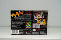 Nintendo Super Nintendo Clay Fighter video game cartridge and original box from 1993, displayed at angle showing front cover artwork and spine