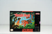 Super Nintendo Disney's The Jungle Book box Mowgli jungle Kaa snake Shere Khan tiger Baloo bear King Louie gold text Virgin Nintendo