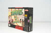 Nintendo Super Nintendo Zombies at My Neighbors complete in box game cartridge and case, 1990s era