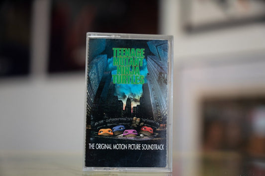 Teenage Mutant Ninja Turtles 1990 original motion picture soundtrack cassette tape with NYC manhole cover art in clear case
