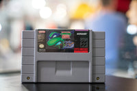 Nintendo Teenage Mutant Ninja Turtles Tournament Fighters SNES cartridge from 1993 with black label and game artwork visible