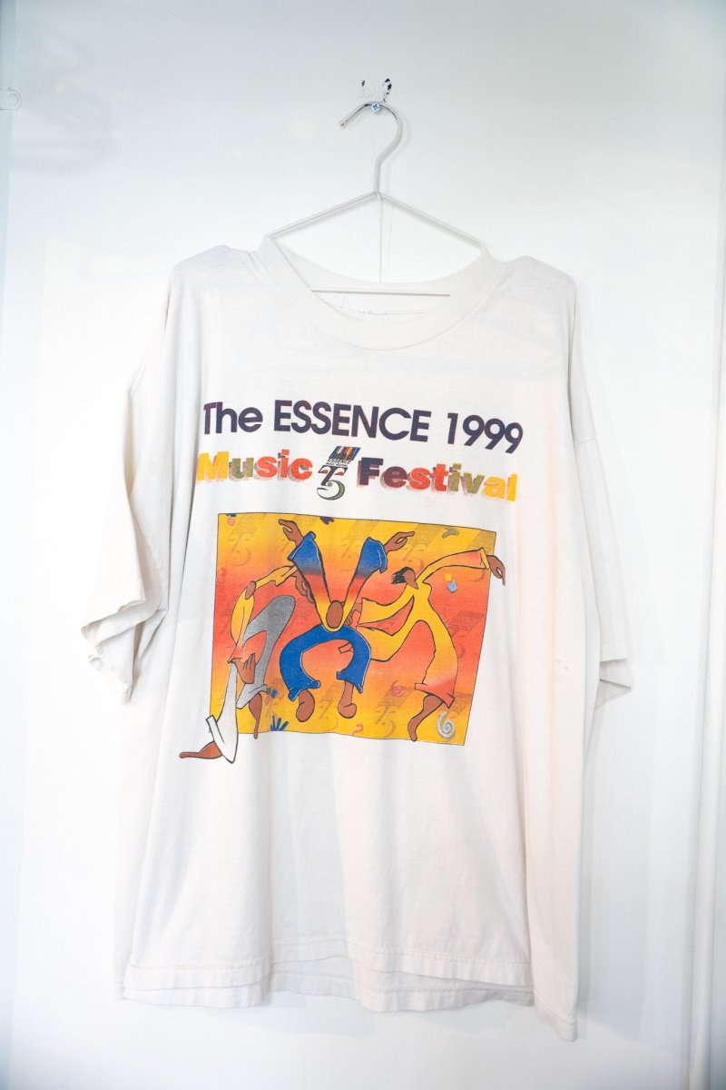 White 1999 Essence Music Festival 5th Anniversary tee with colorful illustrated dancing figures sunset gradient rainbow Music Festival text size XL