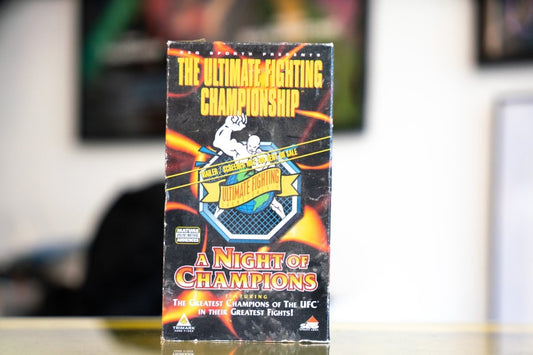 UFC A Night of Champions VHS screener with yellow Ultimate Fighting Championship title orange flame effects original octagon logo and Trimark Home Video release