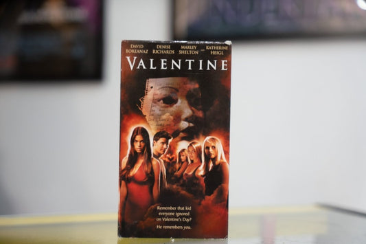Valentine VHS with red fiery backdrop Cupid mask notebook page David Boreanaz Denise Richards Katherine Heigl and white VALENTINE title