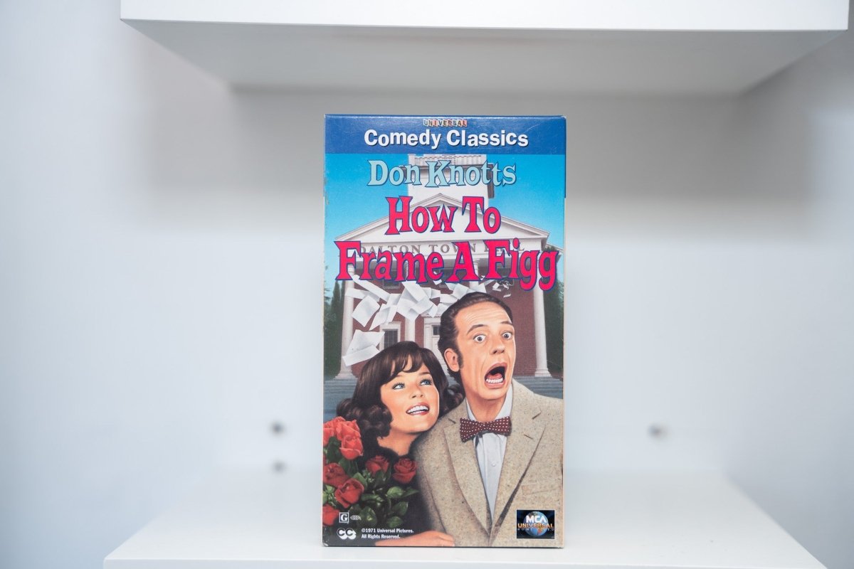 VHS How to Frame a Figg blue Comedy Classics banner Don Knotts shocked expression bow tie town hall papers flying pink title text MCA Universal