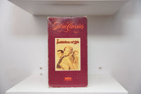 VHS Imitation of Life red plaid Film Classics cover sepia photo Lana Turner two men Imitation of Life red script text MCA Home Video