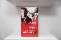 VHS Lethal Weapon 4 red cover Mel Gibson Danny Glover Joe Pesci Rene Russo Chris Rock Jet Li LETHAL WEAPON 4 silver text gang tagline Warner Bros