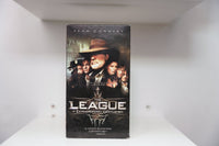 VHS League of Extraordinary Gentlemen dark cover Sean Connery fedora overcoat ensemble cast Victorian cityscape ornate LEAGUE silver gold text