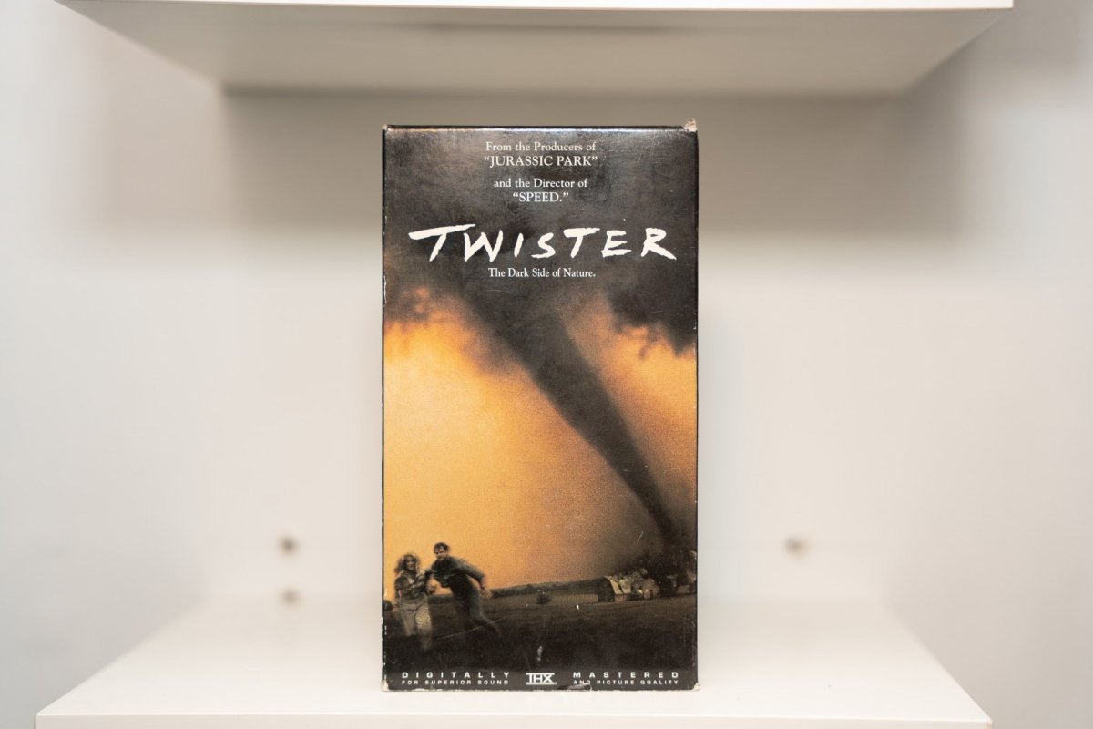 VHS Twister massive tornado orange amber sky people running TWISTER white handwritten text Dark Side of Nature tagline THX Warner Bros