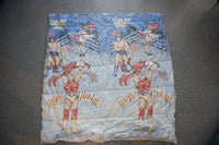 WWF 1980s wrestling comforter featuring Hulk Hogan, Roddy Piper, Junk Yard Dog and The Sheik, red and yellow quilted fabric with broken zipper