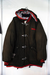 Starter 1991 UNLV Runnin' Rebels "Fireman" Parka in XL with red and black colorway, displayed flat showing front torso area, zipper missing